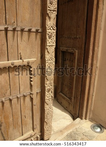 Oman / Doors in Jabrin Fort / picture showing the old doors leading to rooms in the Jabrin Fort, Oman, taken in June 2014