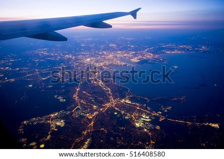 View on Greater Boston Area from a plane approaching Logan Airport. Royalty-Free Stock Photo #516408580