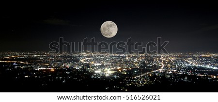 City from the view point on top of mountain  with super moon at night, Chiangmai Thailand