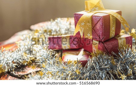 Chris mas silver tinsel gift box isolated on white background.
