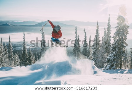 Skier jumping Royalty-Free Stock Photo #516617233