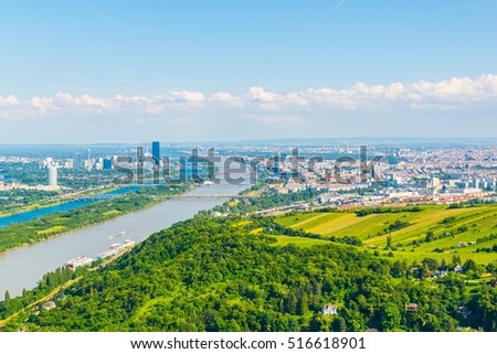 Aerial view of danube river, donauinsel island and vienna international center from kahlenberg hill in vienna