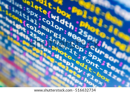 Binary digits code editing. Javascript functions, variables, objects. Programming code abstract screen of software developer. Source code close-up. Writing programming code on laptop. 
