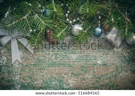 Christmas garland on wooden table with copy space 
