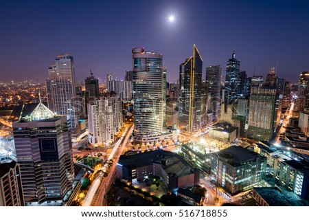 Makati Skyline at night. Makati is a city in the Philippines` Metro Manila region and the country`s financial hub. It`s known for the skyscrapers and shopping malls. Royalty-Free Stock Photo #516718855