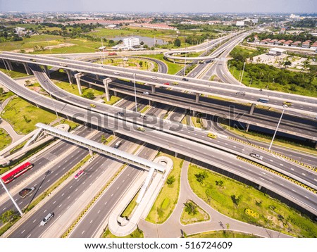 Aerial view over the road and highway, Aerial shot of highway interchange of a city, Shot from drone
