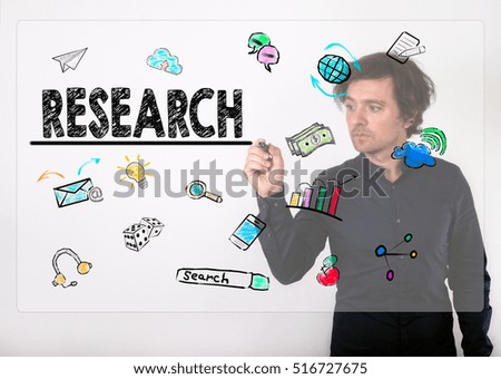 Research concept. Businessman writing with black marker on visual screen