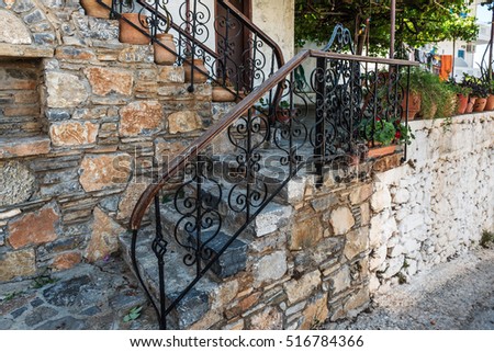 Traditional Greek vintage stairs with beautiful handrails