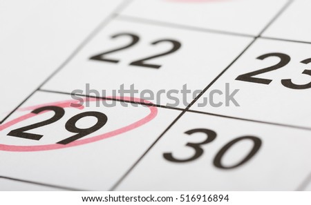 Mark the date number 29. The twenty-ninth day of the month is marked with a red circle. Focus point on the marked number.