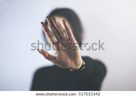 Young woman showing her denial with NO on her hand Royalty-Free Stock Photo #517015342