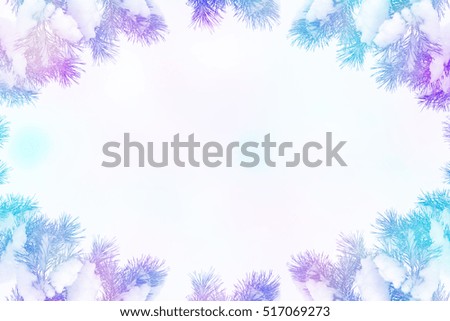 Winter. Snow covered trees. Festive frame with fir branches.