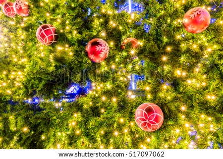 Decorative Christmas tree with red ball and light background