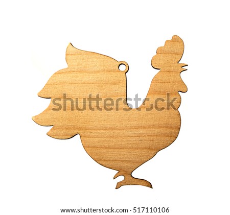 Wooden white rooster. New Year. hand hold Cock isolated on white background. empty copy space for inscription or other objects. Idea of happy new year 2017 on the eastern calendar