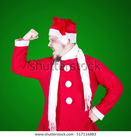 Funny man dressed as santa claus