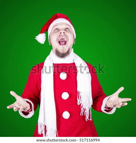 Funny man dressed as santa claus