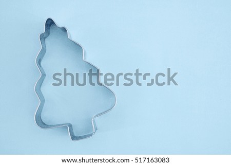 A studio photo of a christmas cookie cutter