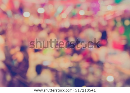 blur image of Tables and decoration prepared for birhtday party for background usage. (vintage tone)
