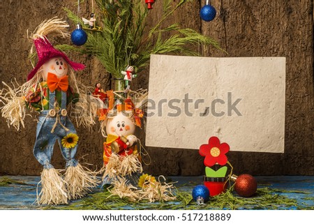 Christmas greeting card,funny Nativity scene with scare crow and blank paper to write message
