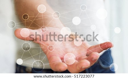 Businessman on blurred background holding circle digital data network in his hand 3D rendering