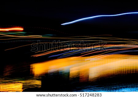 abstract background with speed motion of lights, with wavy lines.