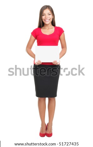 Woman holding sign isolated. Full body image of young beautiful multiracial woman holding blank sign. Isolated on white background.