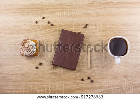 cupcakes notebook tiramisu homemade cakes coffee dessert coffee on a wooden background dark light pink gentle cream breakfast