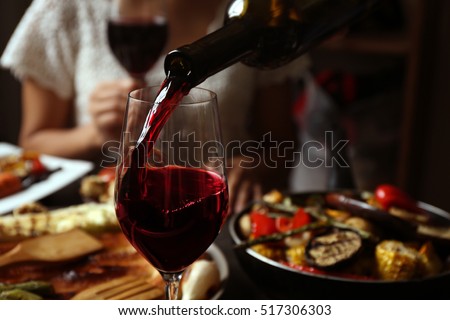 Delicious dinner with grilled vegetables and wine