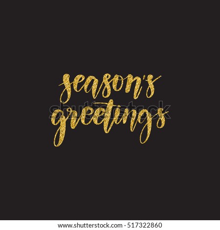 Hand written winter phrase - Season's greetings. Golden glitter calligraphy isolated on black background. Great element for your Christmas design
