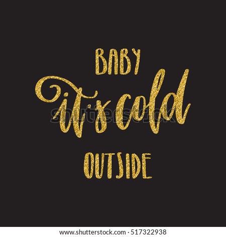Hand written winter phrase - Baby it's cold outside. Golden glitter calligraphy isolated on black background. Great element for your Christmas design
