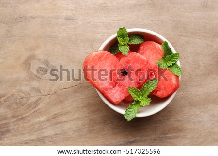 Watermelon on wooden table background