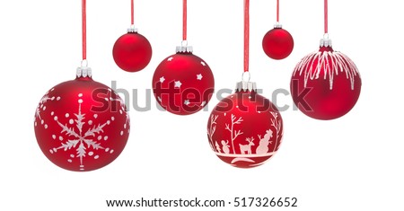 Row of Six hanging Christmas Baubles isolated on a white background Royalty-Free Stock Photo #517326652