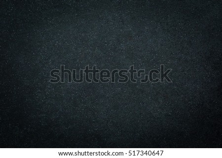 Dark stone seamless texture. Dark background of floor tile or plastic material.