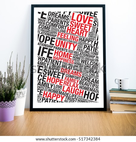 Frame on desk with home word cloud image