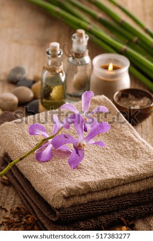 Spa set on old wood with grove, orchid