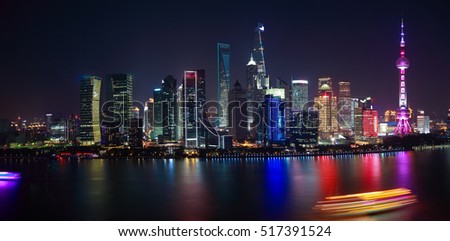 Aerial photography bird view city landmark buildings background at Shanghai Skyline of panorama of night scene
