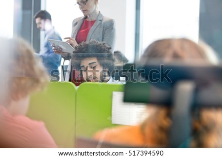 Multi-ethnic business people working in office