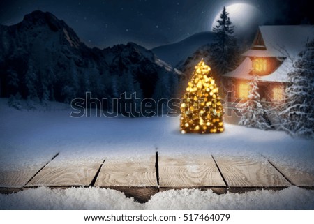 Wooden table of free space for your decoration and night time in christmas night 