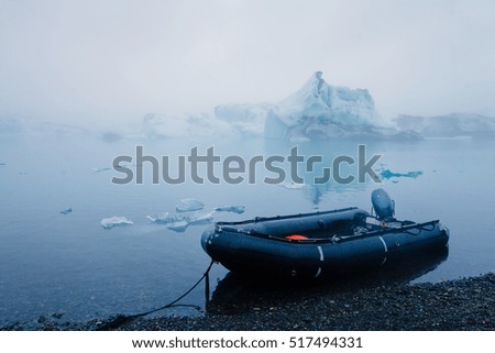 Beatiful vibrant picture of icelandic glacier and glacier lagoon with water and ice in cold blue tones
