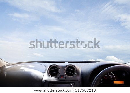 windscreen , car dashboard in front of  blue sky Royalty-Free Stock Photo #517507213