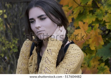 beautiful girl in the autumn forest