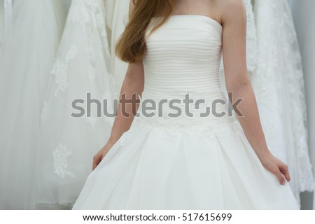 Wedding bridal white dress in the showroom, fashion, abstract, shallow focus, textile, texture