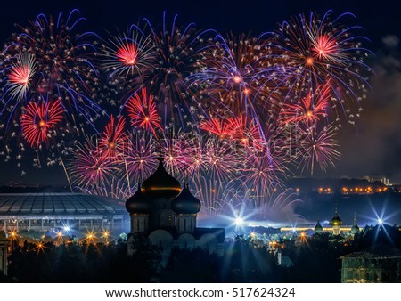 Firework above Luzhniki stadium and church at night in Moscow, Russia Royalty-Free Stock Photo #517624324