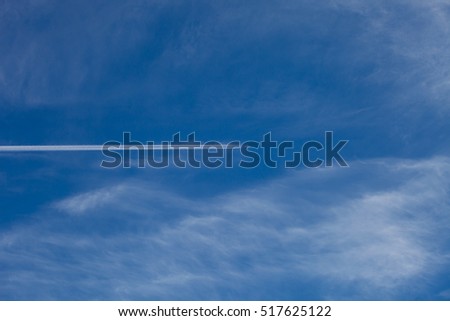 Bright day with blue sky  and airplane