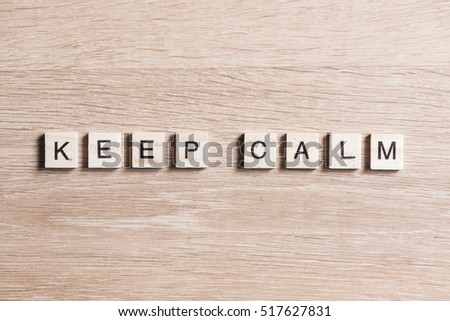 keep calm phrase collected of wooden elements with the letters