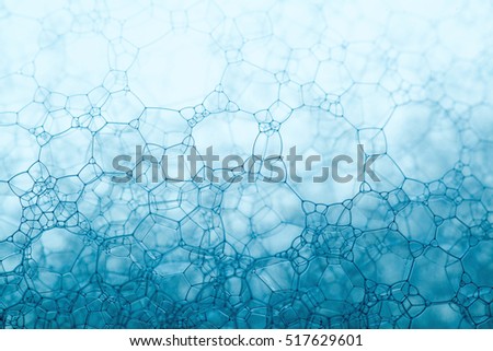 foam blue texture soap bubbles on the water abstract background