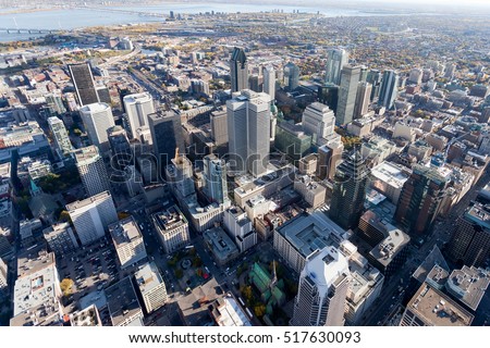 Aerial from from above Montreal city center and its landmark buildings, Canada.