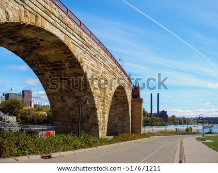 This is the Mill Ruins Park in Minneapolis, Minnesota. It features the Stone Arch Bridge.