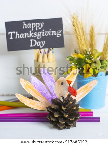 Beautiful Happy Thanksgiving Day card.  cute happy cartoon of turkey bird colorful made by kids from cone pencils. vintage filter