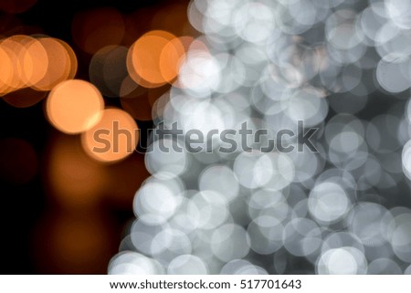 Thailand Christmas fair - out-of-focus bokeh background with illuminated snowflakes and christmas tree