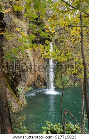 Plitvice lakes national park, waterfall, autumnal twilight, purposely blurred, selective focus
